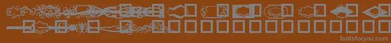 GcdesignDing3 Font – Gray Fonts on Brown Background