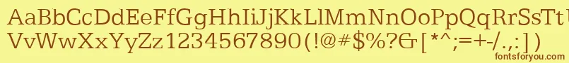 フォントEgyptianTextLightRegular – 茶色の文字が黄色の背景にあります。