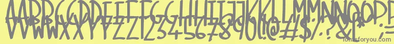 SkinnyMarker Font – Gray Fonts on Yellow Background