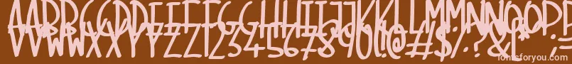 SkinnyMarker Font – Pink Fonts on Brown Background