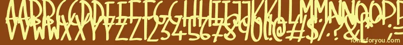 SkinnyMarker Font – Yellow Fonts on Brown Background