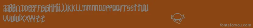 YoungZaphod-fontti – harmaat kirjasimet ruskealla taustalla