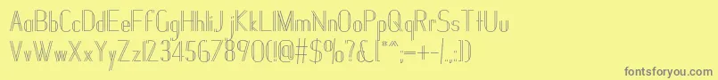 フォントJanesville51 – 黄色の背景に灰色の文字