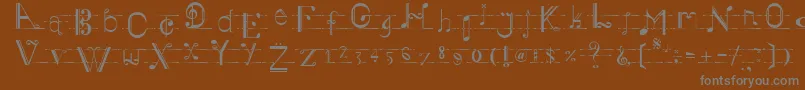 フォントMusiker – 茶色の背景に灰色の文字