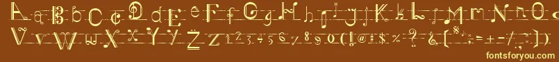 Musiker-fontti – keltaiset fontit ruskealla taustalla