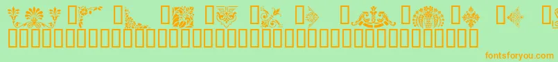 VictorianDesignsThree Font – Orange Fonts on Green Background