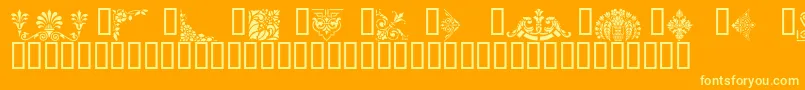 VictorianDesignsThree-Schriftart – Gelbe Schriften auf orangefarbenem Hintergrund