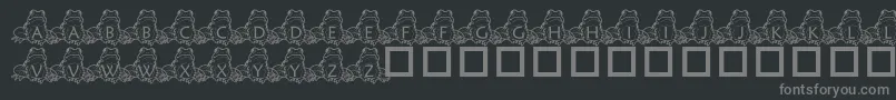 PfFrogSitting-fontti – harmaat kirjasimet mustalla taustalla