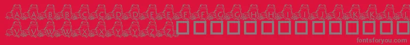 PfFrogSitting-fontti – harmaat kirjasimet punaisella taustalla
