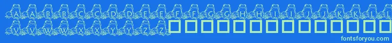Czcionka PfFrogSitting – zielone czcionki na niebieskim tle