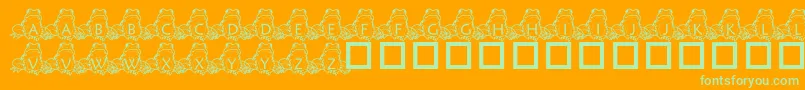 PfFrogSitting-fontti – vihreät fontit oranssilla taustalla