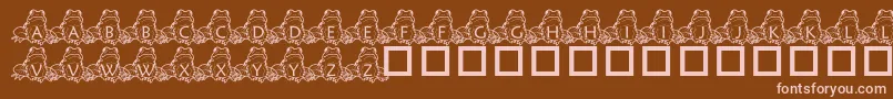 PfFrogSitting-fontti – vaaleanpunaiset fontit ruskealla taustalla