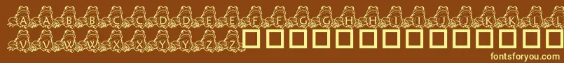 PfFrogSitting-fontti – keltaiset fontit ruskealla taustalla