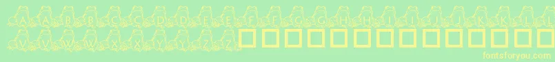 Czcionka PfFrogSitting – żółte czcionki na zielonym tle