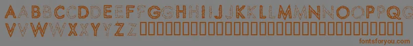 Więcej informacji o czcionce SpikeCrumbSwizzle Czcionka SpikeCrumbSwizzle – brązowe czcionki na szarym tle