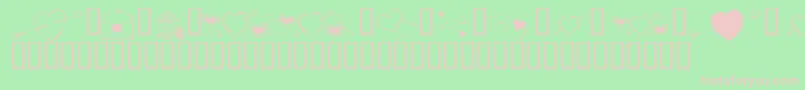 フォントKrCuoriDivertenti7 – 緑の背景にピンクのフォント