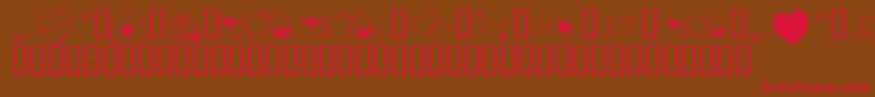 フォントKrCuoriDivertenti7 – 赤い文字が茶色の背景にあります。