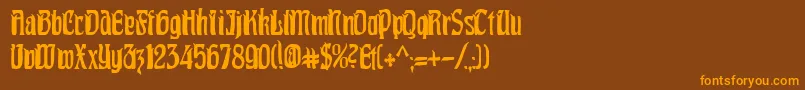 PittoreskCondensed Font – Orange Fonts on Brown Background