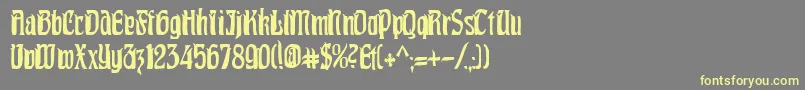 フォントPittoreskCondensed – 黄色のフォント、灰色の背景