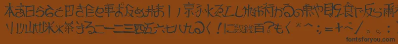 フォントJapTradTtf1.183.1 – 黒い文字が茶色の背景にあります