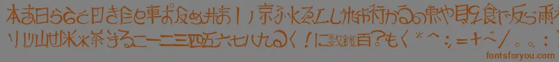 フォントJapTradTtf1.183.1 – 茶色の文字が灰色の背景にあります。