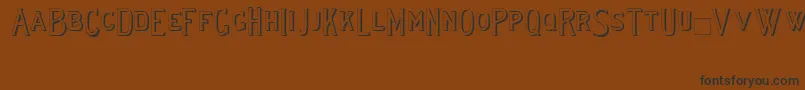 Lewishamshadowii Font – Black Fonts on Brown Background