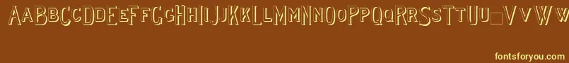 Lewishamshadowii-fontti – keltaiset fontit ruskealla taustalla