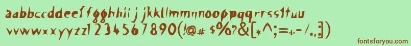 Шрифт ScissorCuts – коричневые шрифты на зелёном фоне