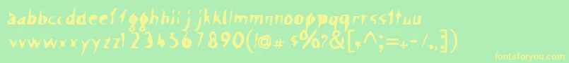 ScissorCuts Font – Yellow Fonts on Green Background