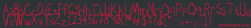 LeftyDoesRightyCharcoal Font – Red Fonts on Black Background