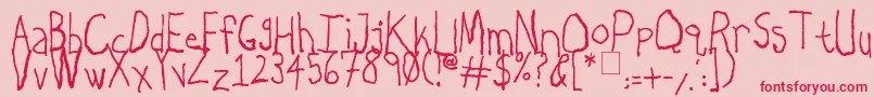 LeftyDoesRightyCharcoal Font – Red Fonts on Pink Background