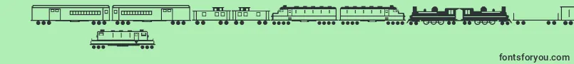 Fonte Trains – fontes pretas em um fundo verde