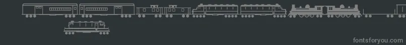 フォントTrains – 黒い背景に灰色の文字