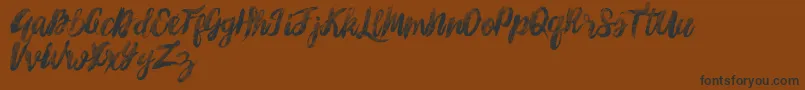 SunshineMelody Font – Black Fonts on Brown Background