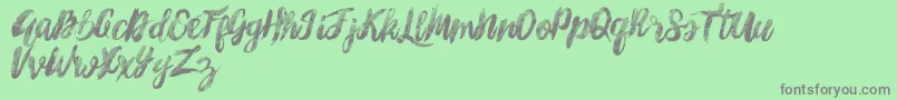 SunshineMelody Font – Gray Fonts on Green Background