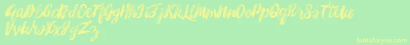 フォントSunshineMelody – 黄色の文字が緑の背景にあります