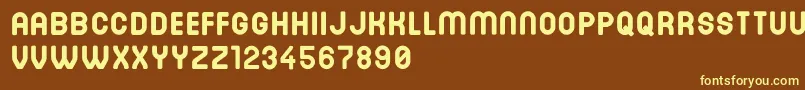 DinastiBold Font – Yellow Fonts on Brown Background