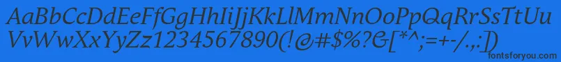 Fonte AndulkaBookProItalic – fontes pretas em um fundo azul