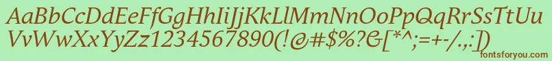 フォントAndulkaBookProItalic – 緑の背景に茶色のフォント