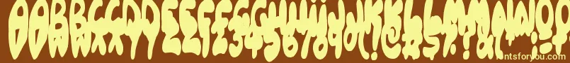 Balloonish-fontti – keltaiset fontit ruskealla taustalla