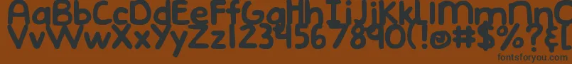 DjbEmphatic Font – Black Fonts on Brown Background