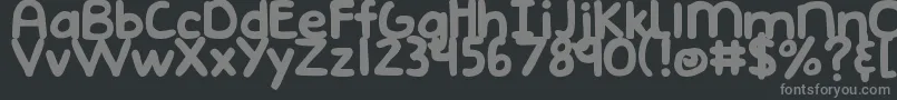 DjbEmphatic-fontti – harmaat kirjasimet mustalla taustalla