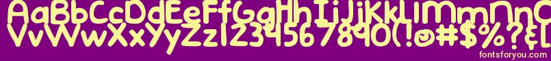 DjbEmphatic-Schriftart – Gelbe Schriften auf violettem Hintergrund