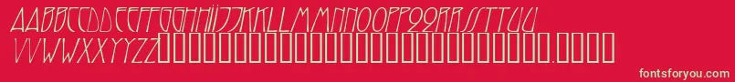Czcionka TrilliumcapssskItalic – zielone czcionki na czerwonym tle
