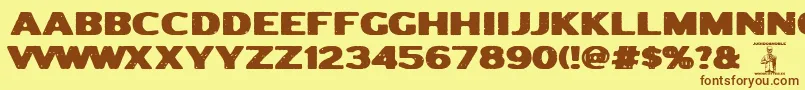 フォントJodidonoble – 茶色の文字が黄色の背景にあります。