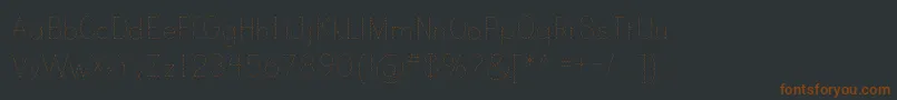 Czcionka PrintDashedTt – brązowe czcionki na czarnym tle