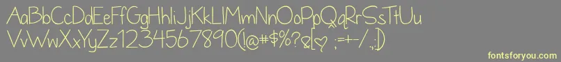 More about DandelionInTheSpring Font DandelionInTheSpring Font – Yellow Fonts on Gray Background