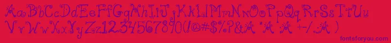 Freak Font – Purple Fonts on Red Background