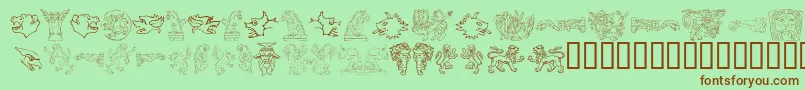 MonstersOfStone-Schriftart – Braune Schriften auf grünem Hintergrund