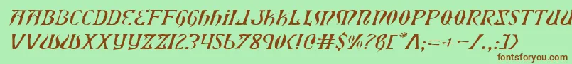 XiphosExpandedLightItalic-fontti – ruskeat fontit vihreällä taustalla